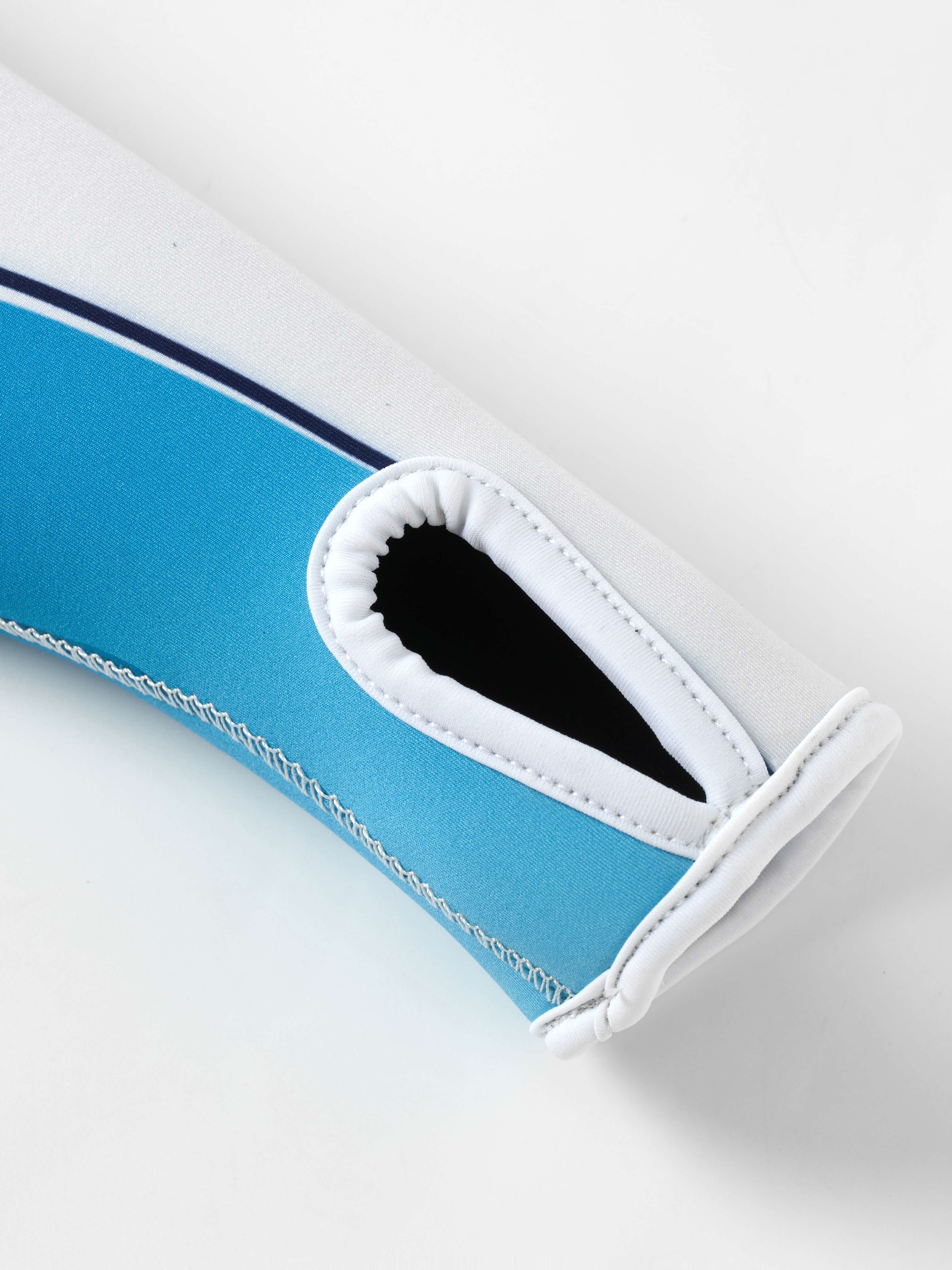 Yanita springsuit long sleeve cuff with reinforced thumb hole opening, turquoise and white neoprene construction