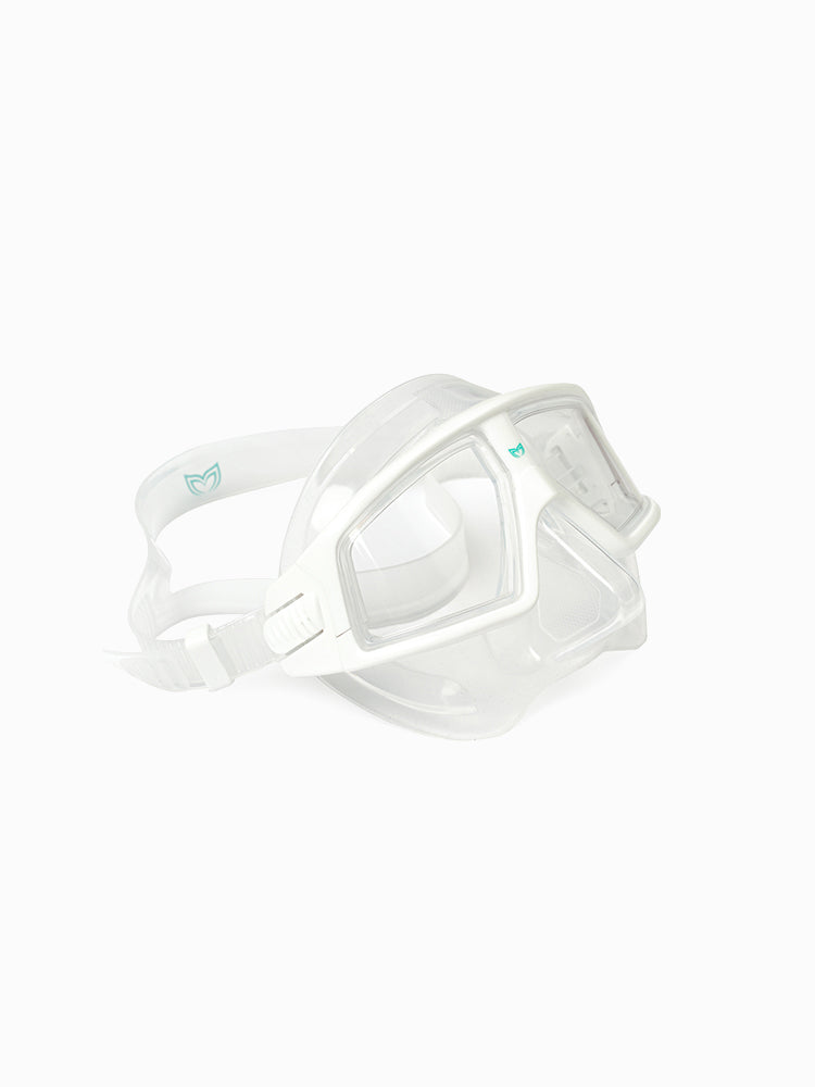 Molchanovs CORE freediving dive mask, white frame with clear skirt, angled side view showing buckle and strap