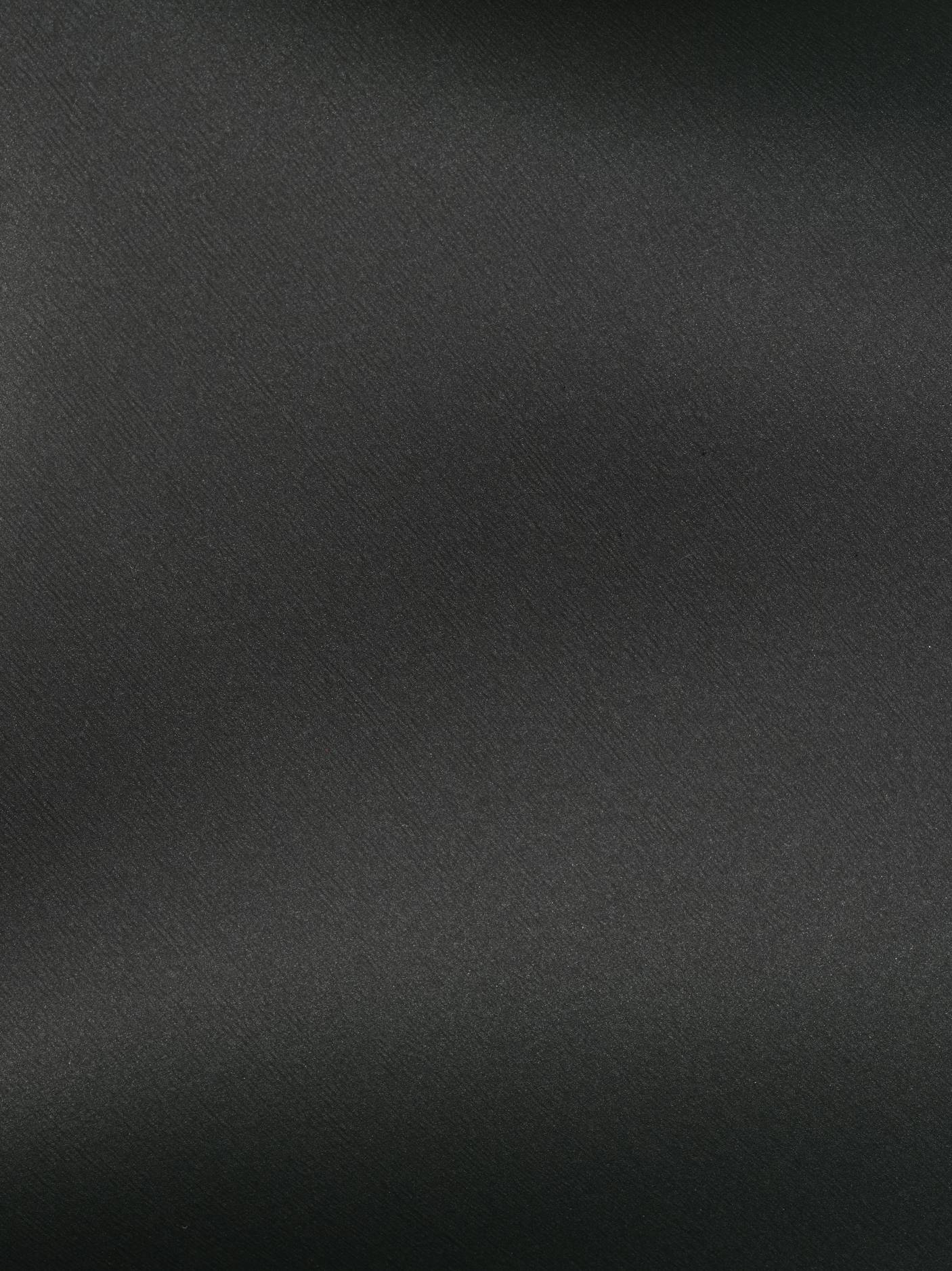 Smooth dark neoprene outer surface of the Molchanovs SPORT freediving wetsuit