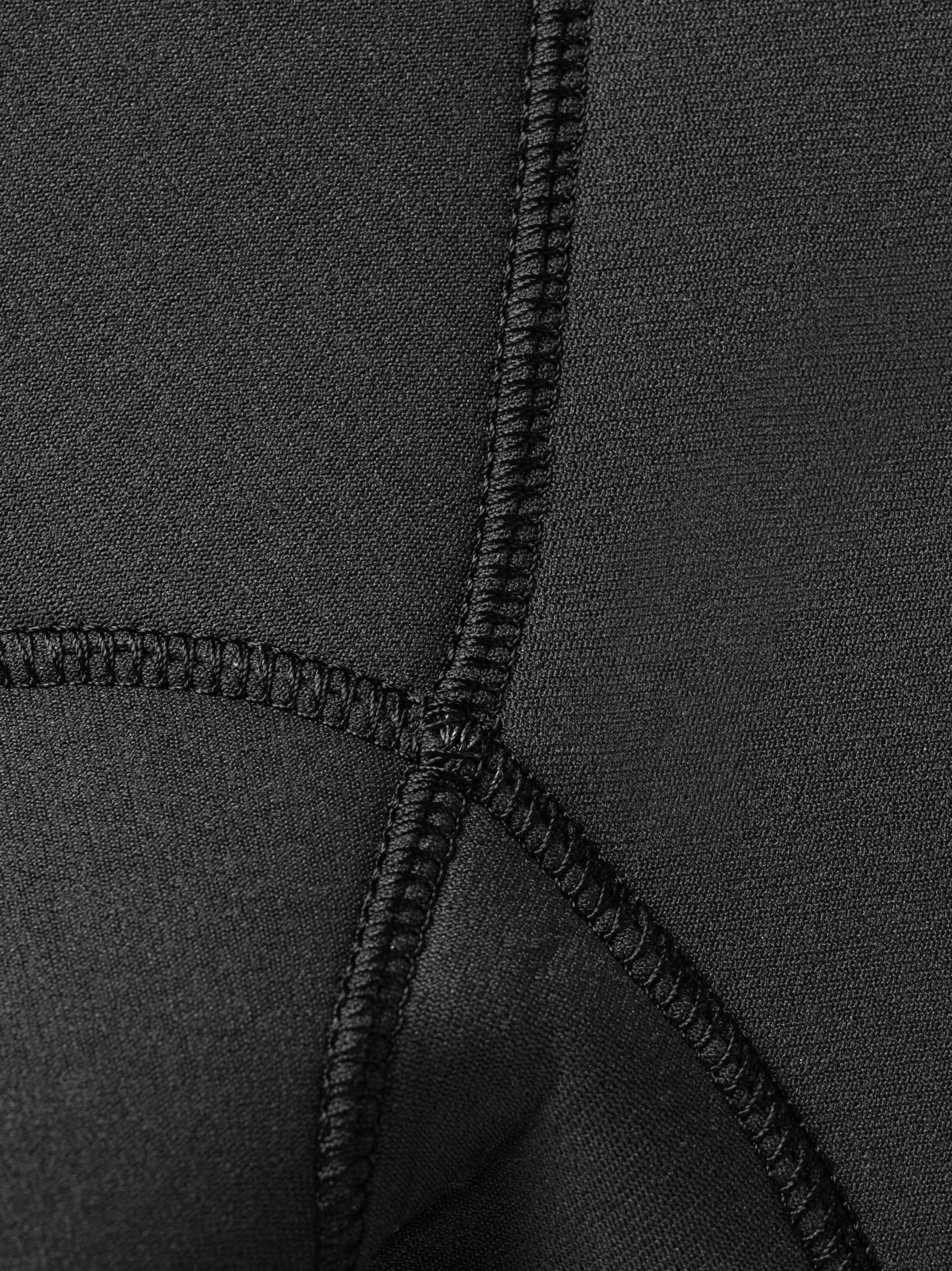 Close up of the quality craftsmanship and durabel stitching that holds this double lined womens suit together