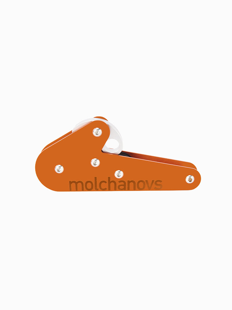 Molchanovs A6061 rope pulley in orange anodized aluminum, side profile showing carabiner slot and roller wheel