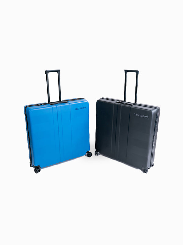 Molchanovs freediving travel trolley cases in blue and dark grey, shown side by side with extended handles