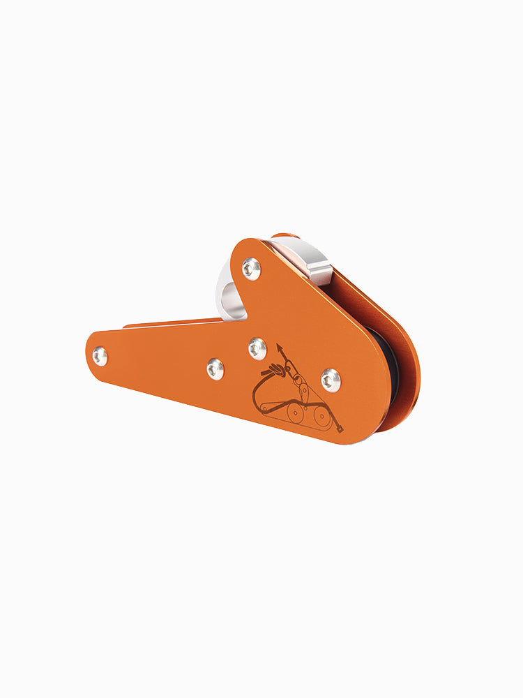 Molchanovs A6061 rope pulley with engraved rope-routing diagram on the orange aluminum body