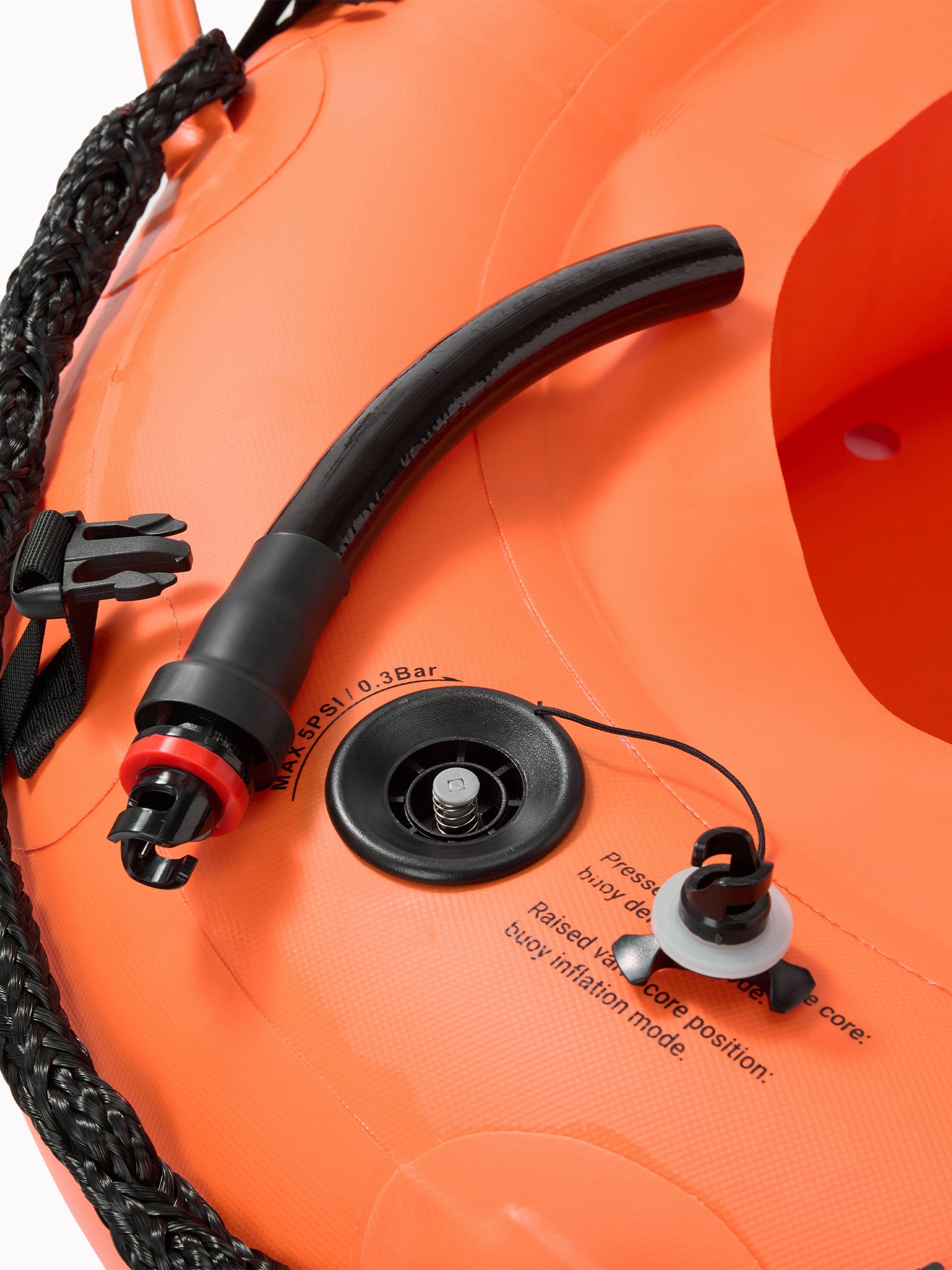 Close-up of the Molchanovs PRO buoy inflation valve and deflation port, labeled MAX 5PSI 0.3 Bar