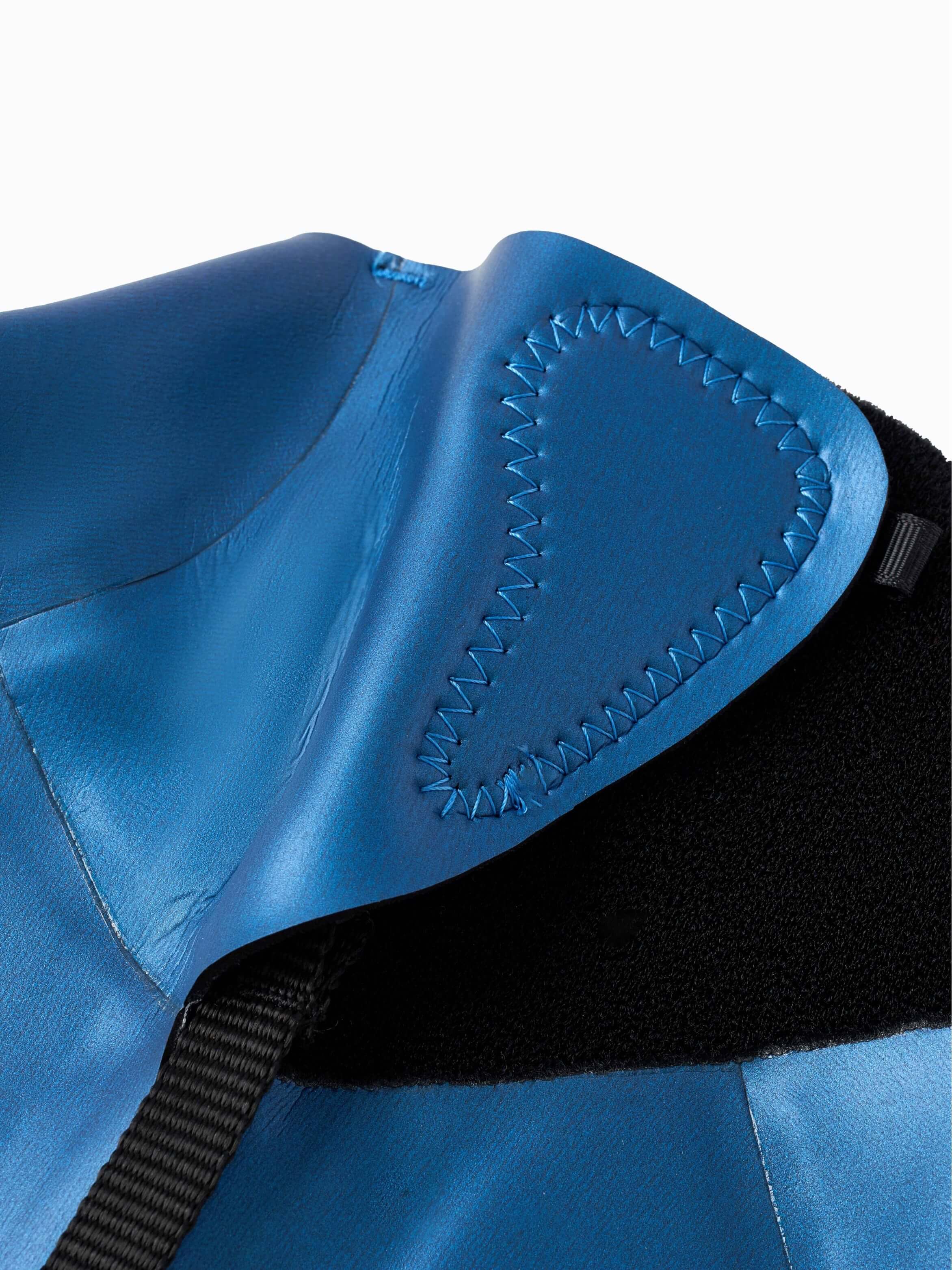 Close-up of the back zipper collar area on the Molchanovs SPORT wetsuit, showing neoprene construction and stitching detail