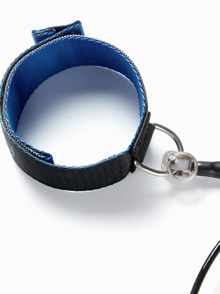 Inside view of the Molchanovs lanyard wrist cuff showing blue padded lining and stainless O-ring attachment