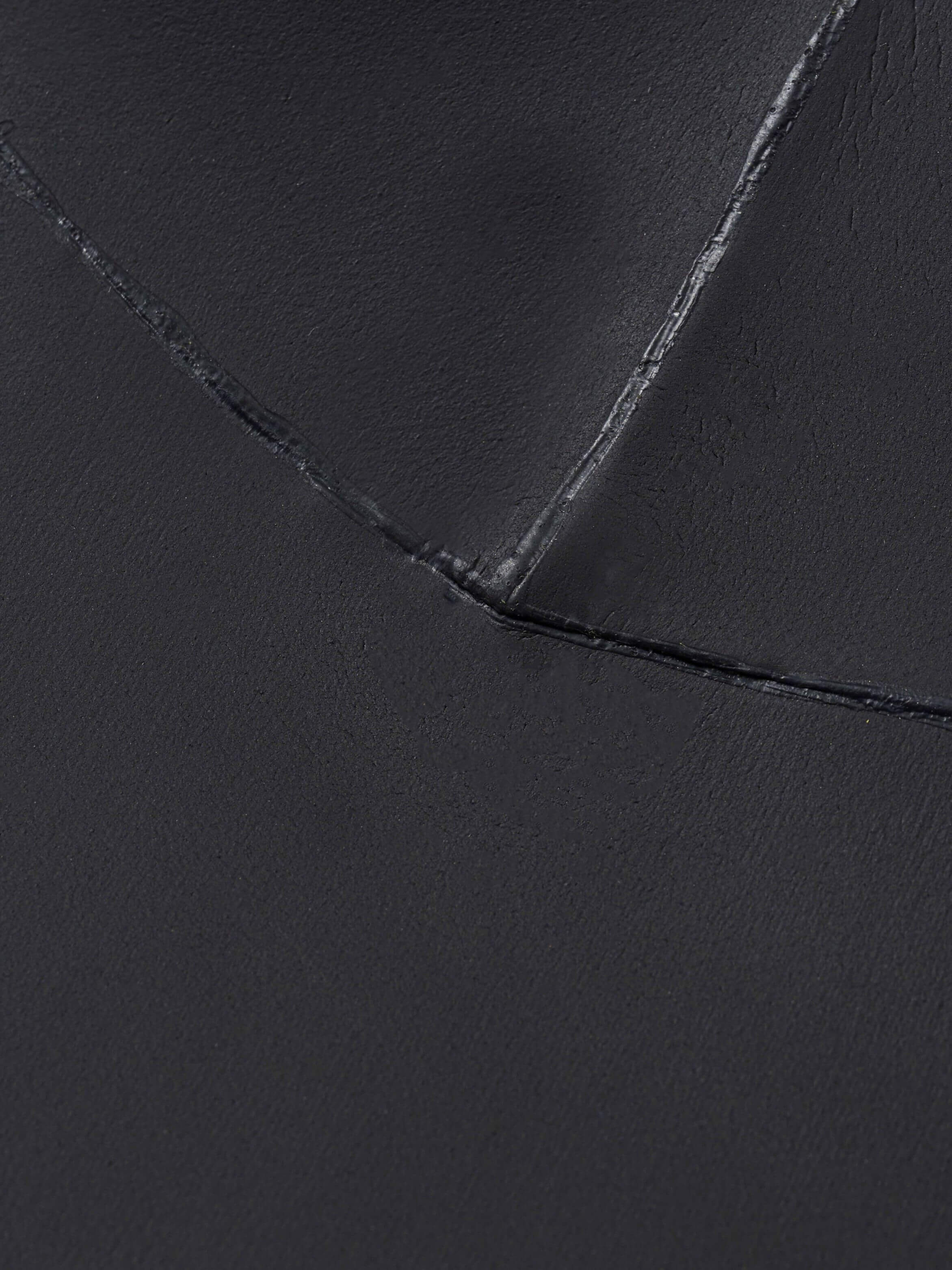 Glued and blind-stitched seam detail on the Molchanovs PRO unlined freediving wetsuit neoprene panels