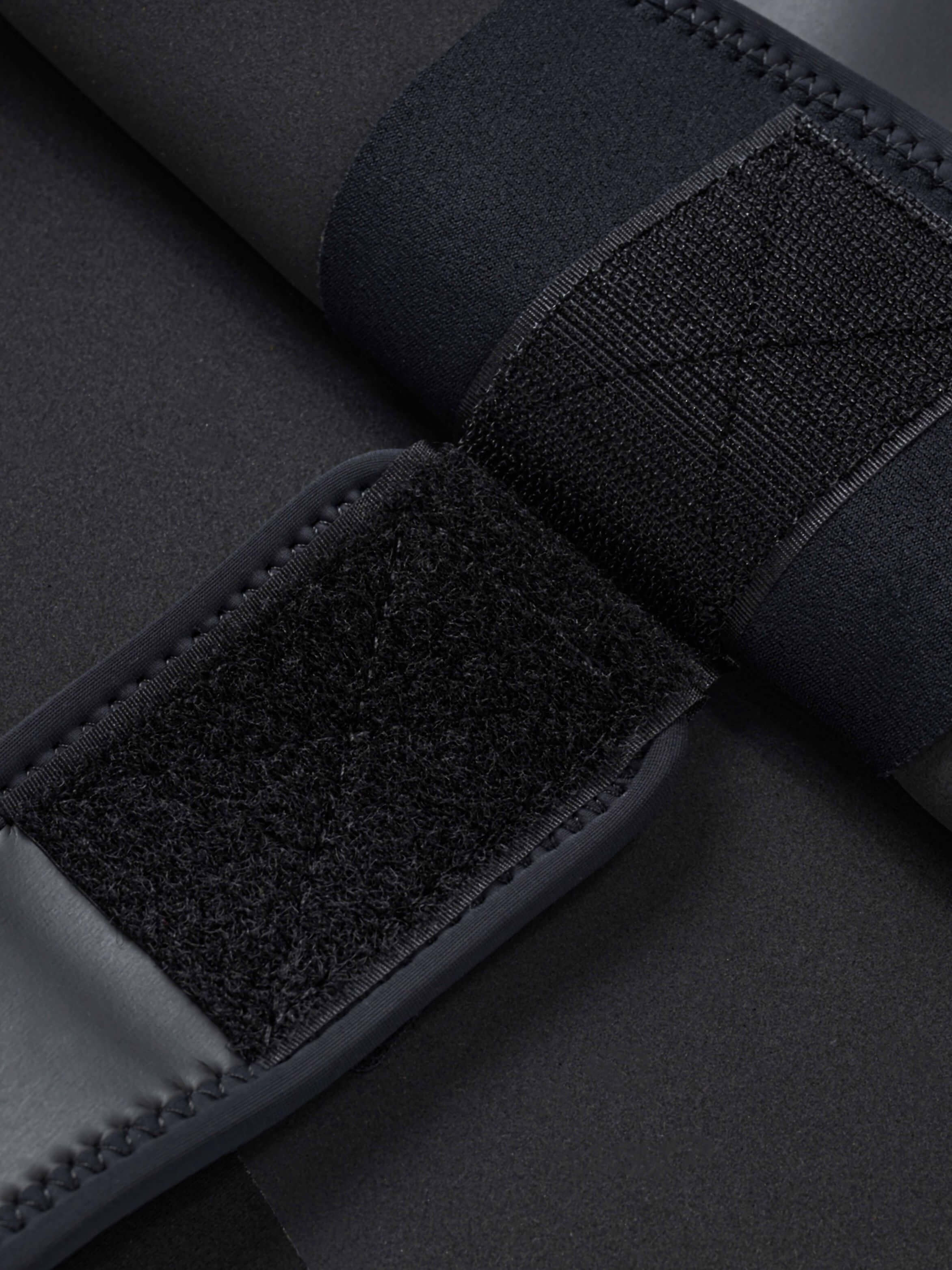 Velcro wrist closure detail on the Molchanovs PRO men's unlined freediving wetsuit