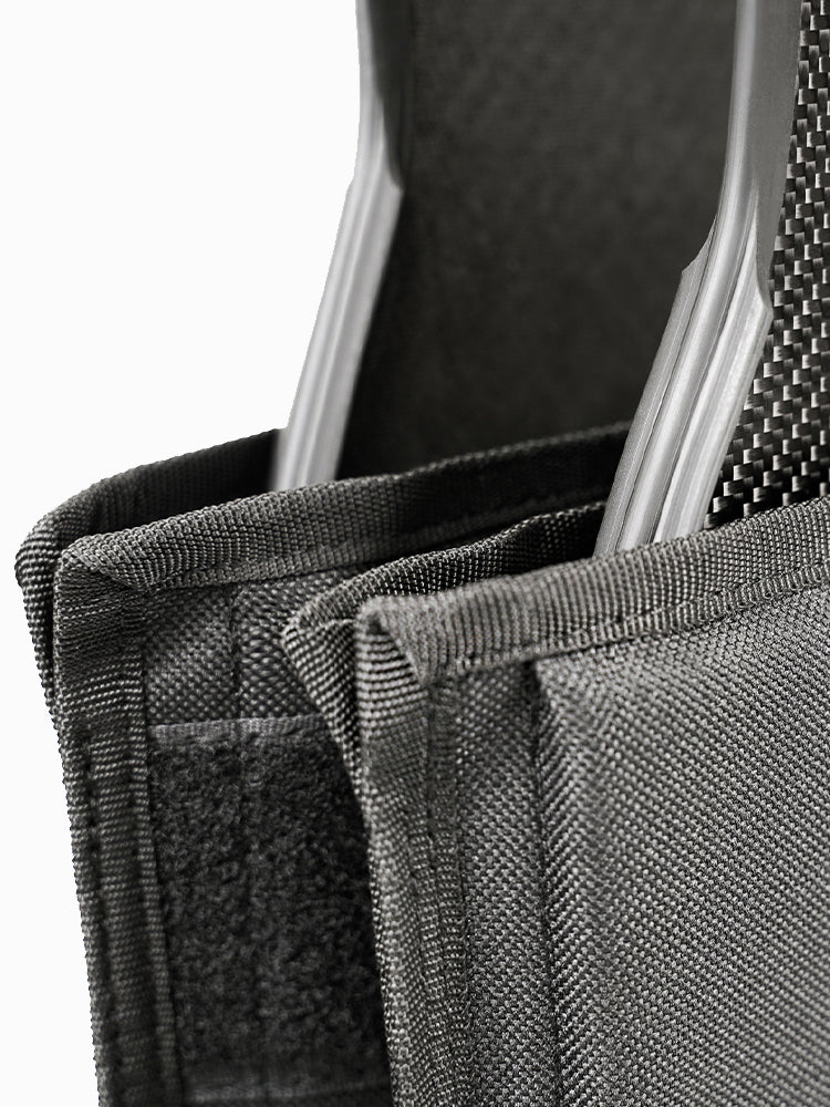 Close-up of Molchanovs bifin blade protector corner showing carbon fin blade inserted and reinforced fabric stitching
