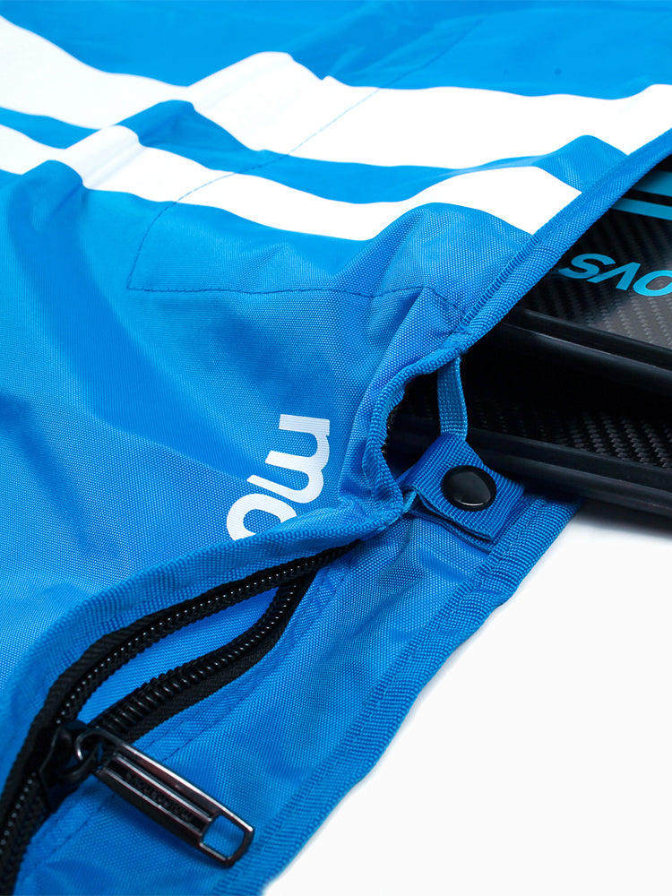 Close-up of the Molchanovs monofin bag zipper and snap closure with a carbon monofin blade inside
