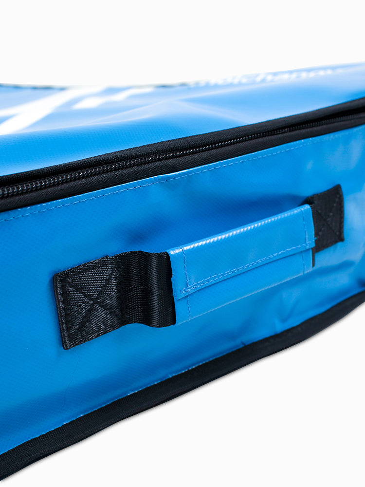 Close-up of the Molchanovs monofin bag zipper and carry handle on the blue variant