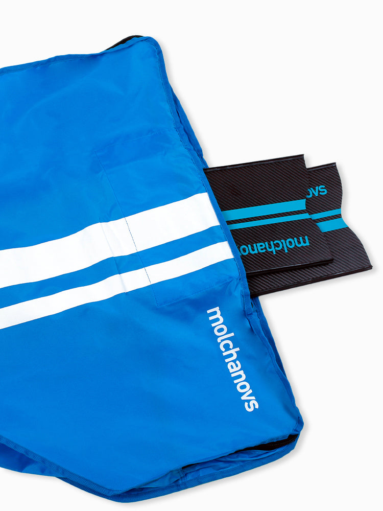Molchanovs Lightweight Monofin Bag 2 open in blue with a carbon monofin blade being removed