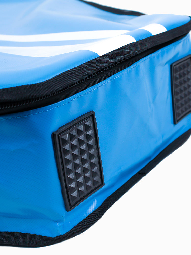 Close-up of rubber non-slip foot pads on the base edge of the Molchanovs monofin bag